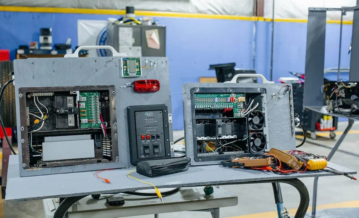 Marcus Reyes testing leveling jack solenoids at a Miami-Dade RV storage location