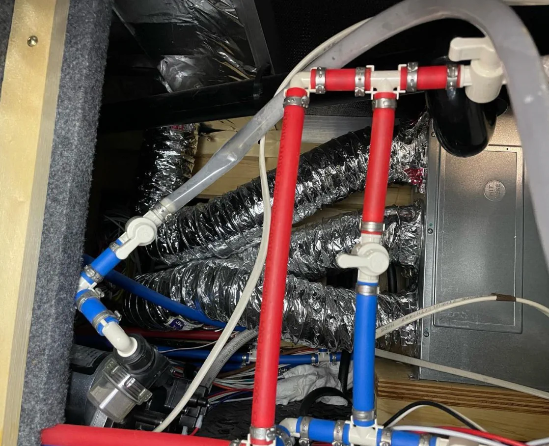 Marcus Reyes testing RV water pump pressure at a Miami-Dade service location