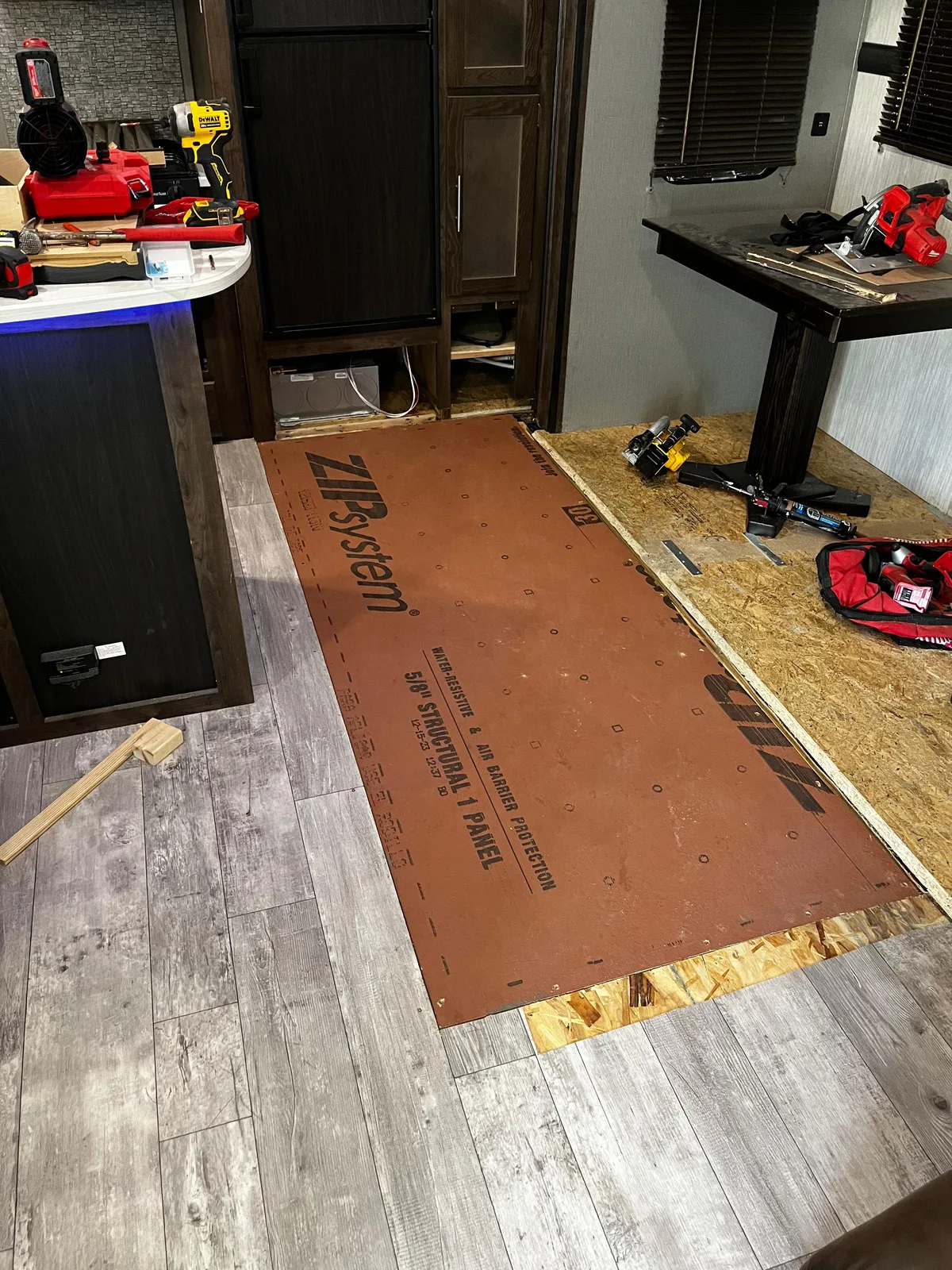 RV roof inspection to find water source causing soft floor damage in Miami-Dade